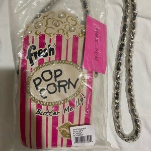 Brand new in the bag with plastic wrap on the chain and tags. Perfect Condition.